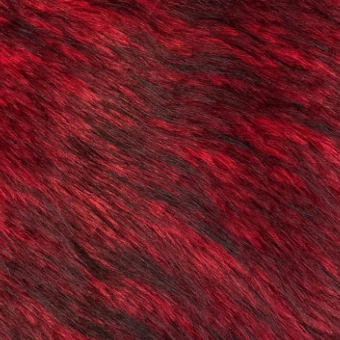 Muestra de tela peluche color bordó jaspeado, textura de pelo.