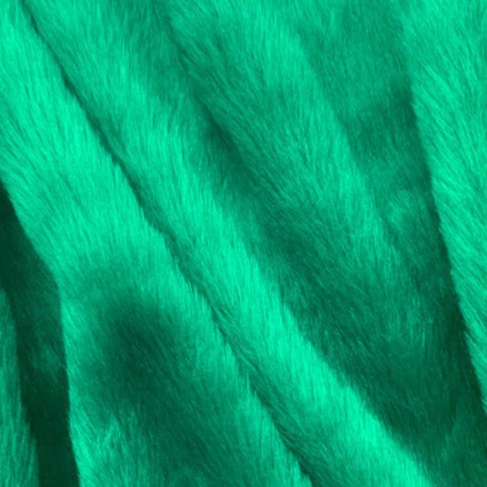 Muestra de tela peluche color esmeralda, textura de pelo.