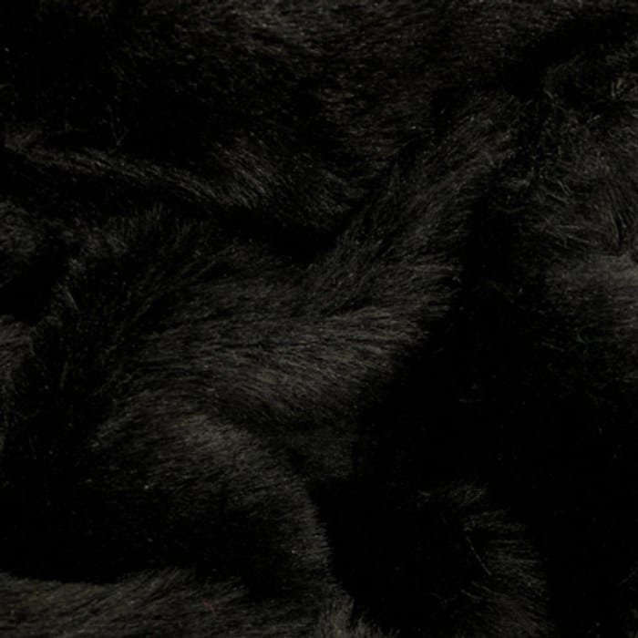 Muestra de tela peluche color negro, textura de pelo.