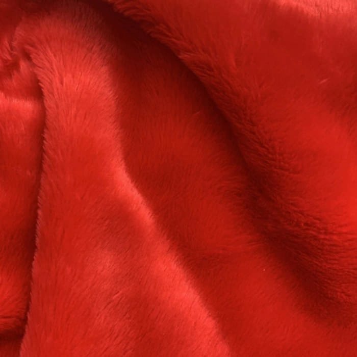 Muestra de tela peluche color rojo, textura de pelo.