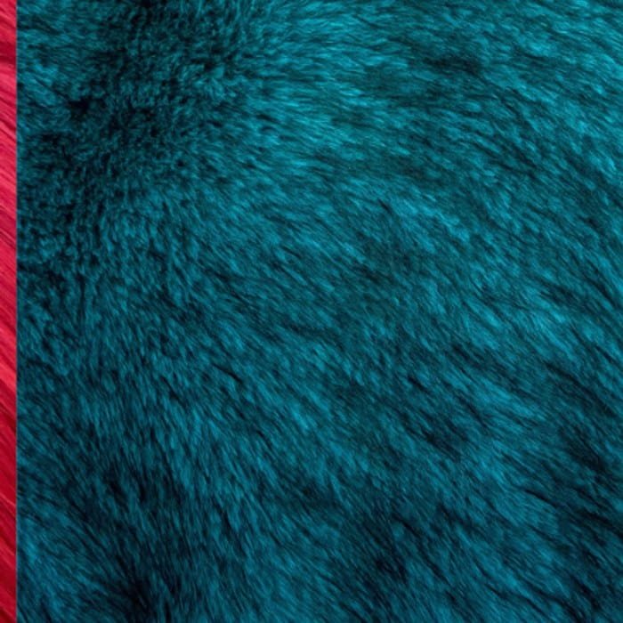Muestra de tela peluche color teal oscuro, textura de pelo.